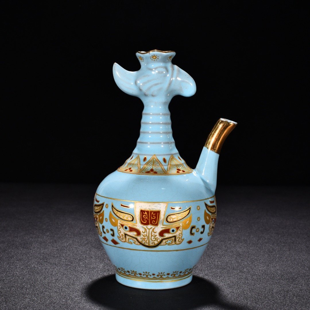 Song Dynasty Ru Kiln sky blue glaze gilded gluttonous animal face pattern eagle head pot