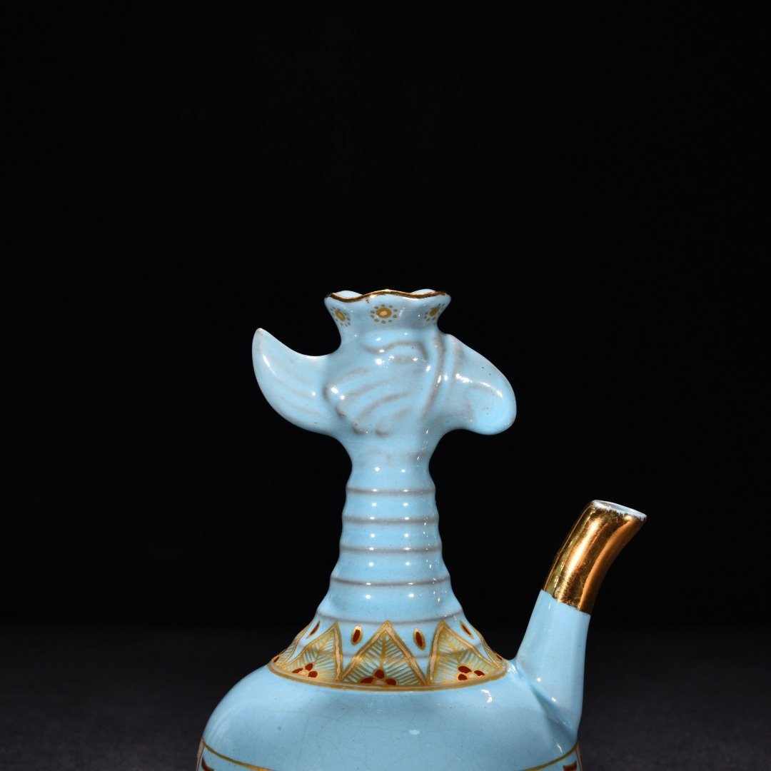 Song Dynasty Ru Kiln sky blue glaze gilded gluttonous animal face pattern eagle head pot