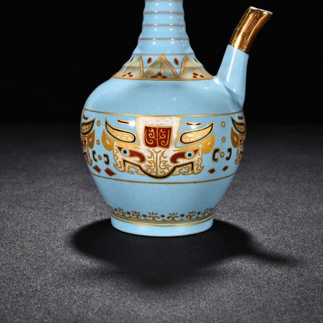 Song Dynasty Ru Kiln sky blue glaze gilded gluttonous animal face pattern eagle head pot