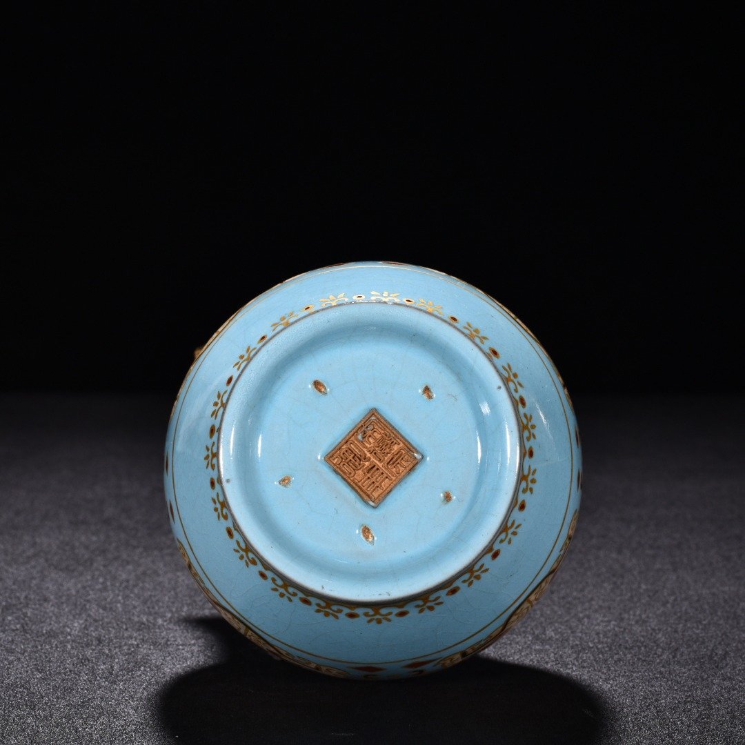 Song Dynasty Ru Kiln sky blue glaze gilded gluttonous animal face pattern eagle head pot