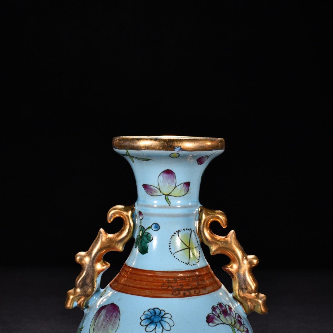 Song Dynasty Ru kiln sky blue glaze pastel gold flower pattern amphorae