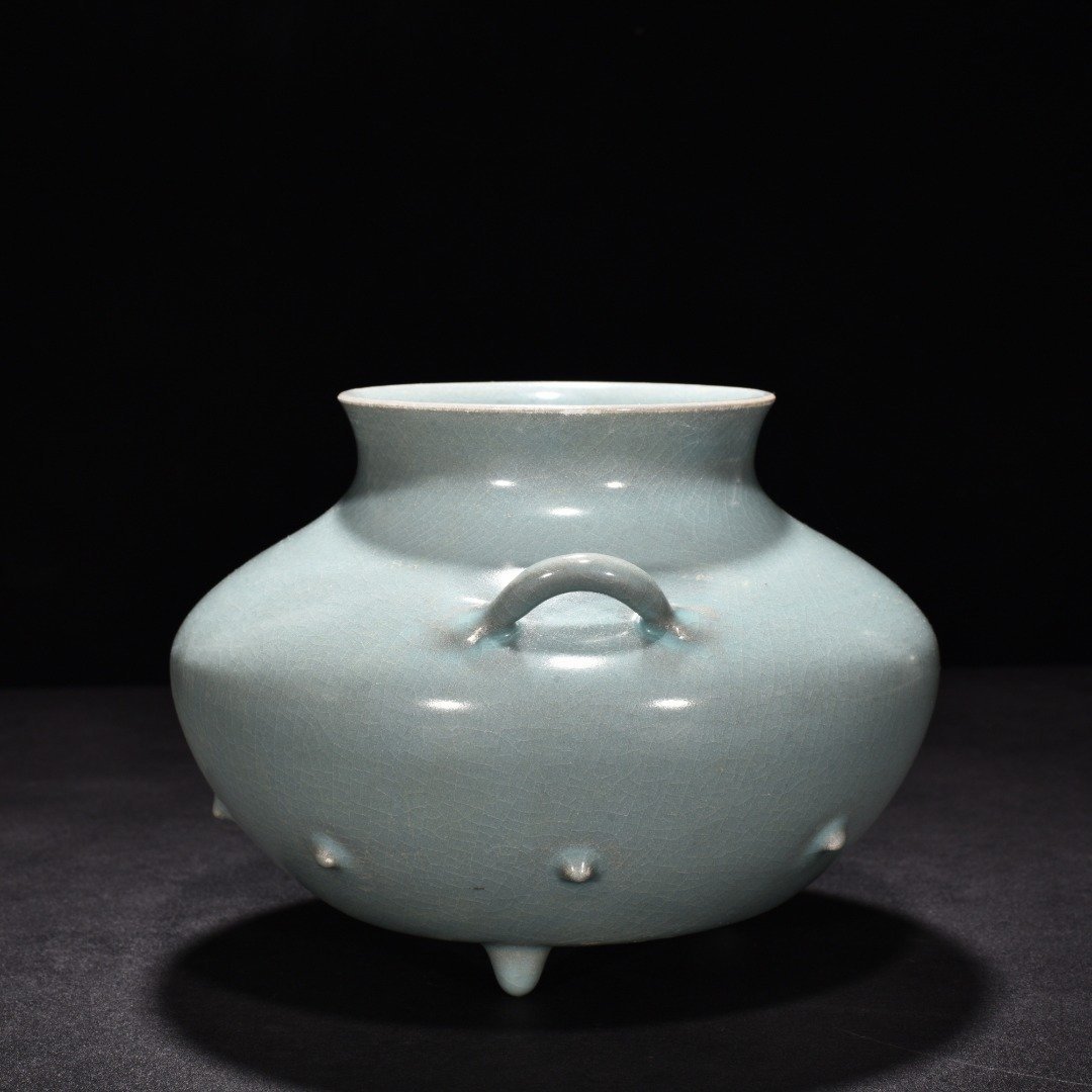 Song Dynasty A sky-green glazed fish basket statue from the Ru Kiln