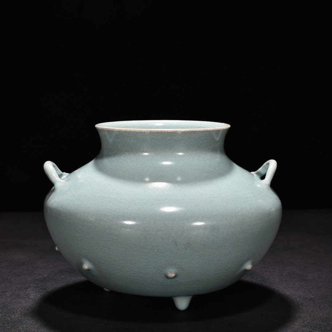 Song Dynasty A sky-green glazed fish basket statue from the Ru Kiln