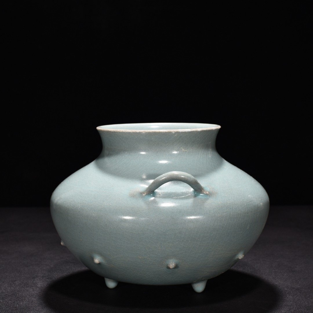 Song Dynasty A sky-green glazed fish basket statue from the Ru Kiln