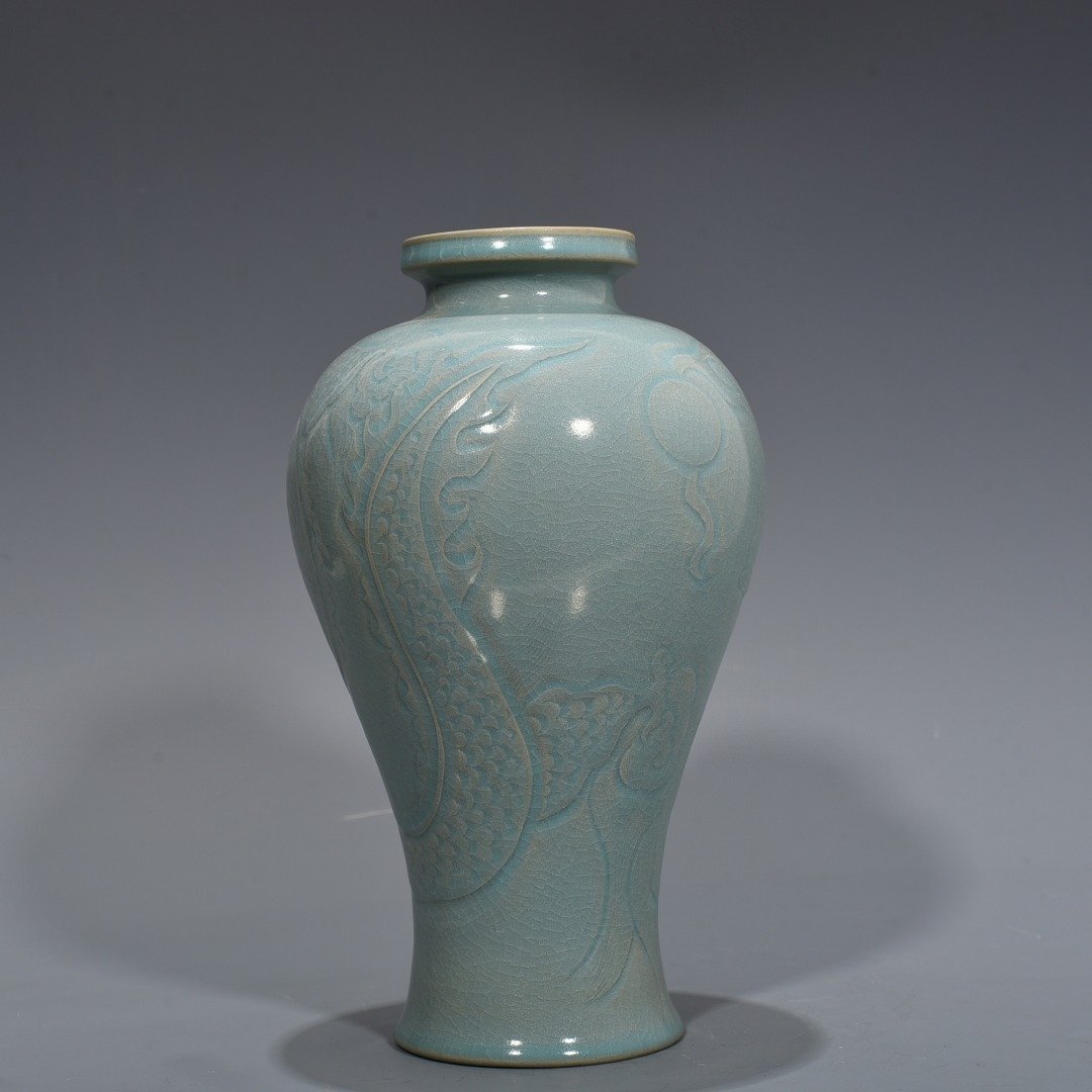 Song Dynasty A wide-mouth plum vase with azure glaze and carved dragon