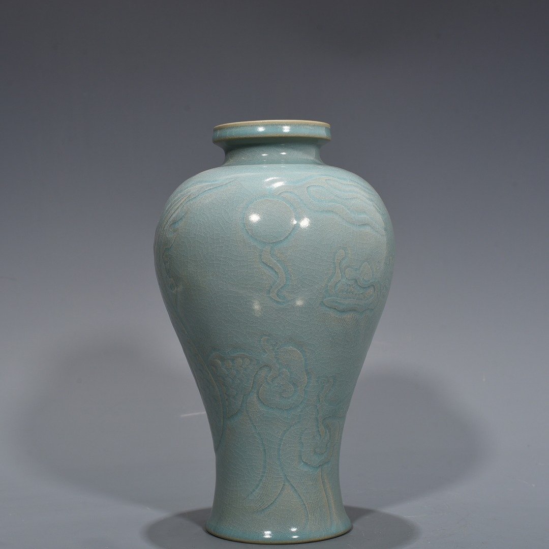 Song Dynasty A wide-mouth plum vase with azure glaze and carved dragon