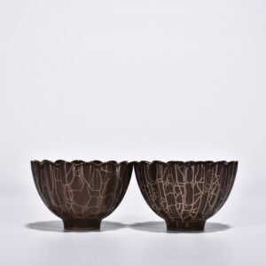 Song Dynasty Xikou official kiln scraped chrysanthemum petal cup