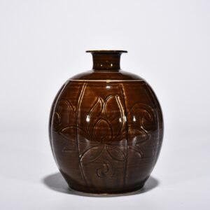 Song Dynasty purple engraved Tubo statue with floral pattern