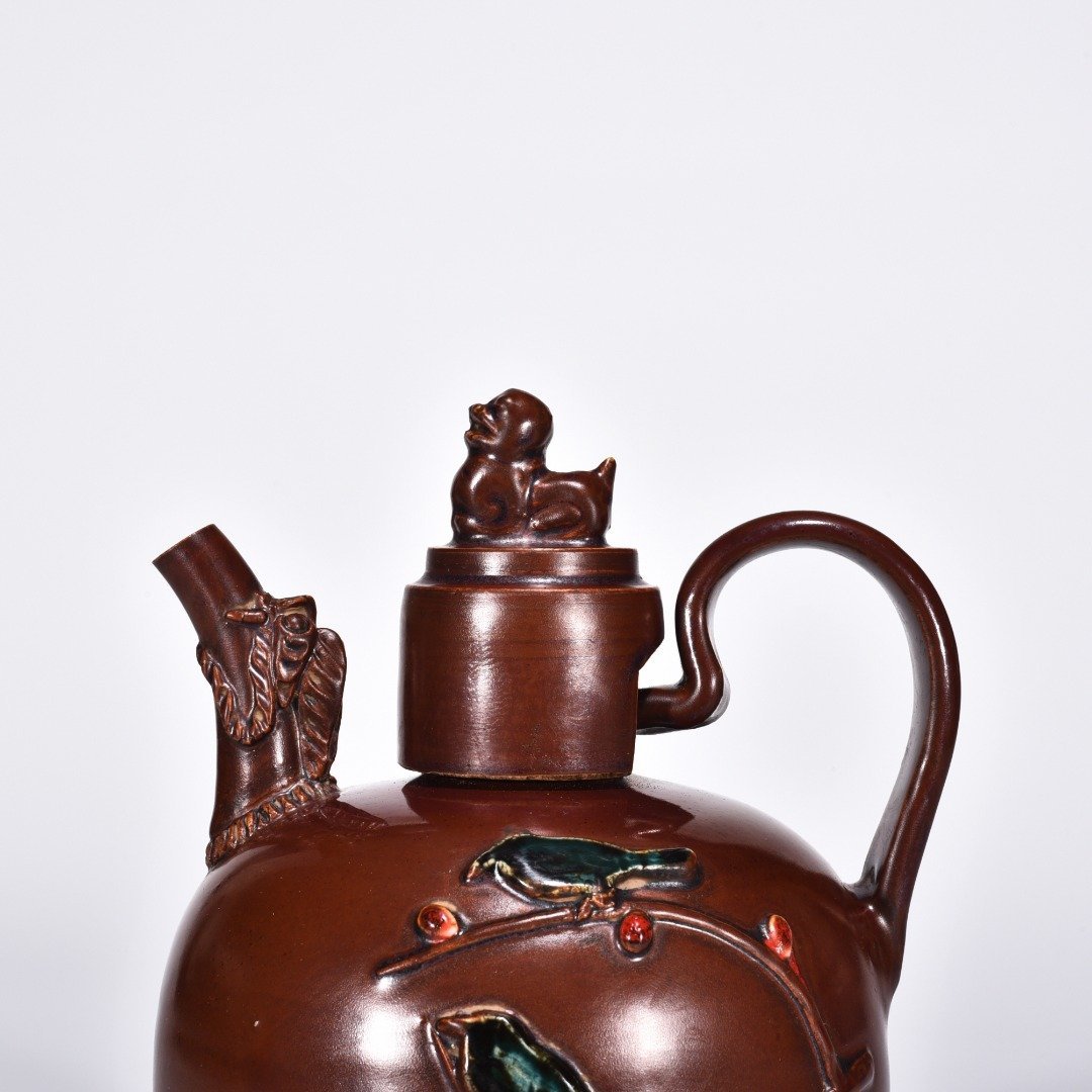 Song Dynasty Ziding plastic ewer with flower and bird patterns