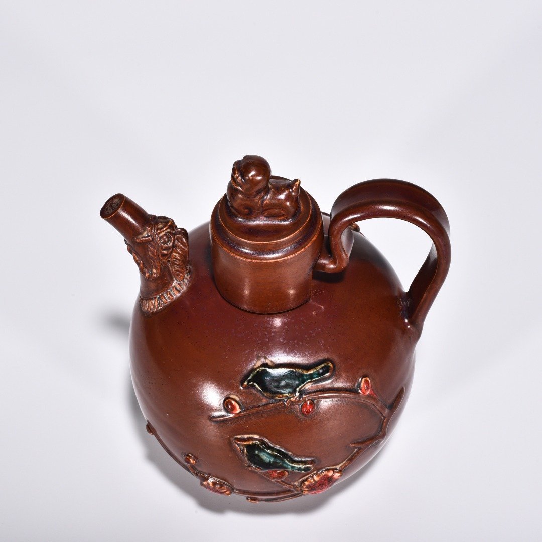 Song Dynasty Ziding plastic ewer with flower and bird patterns