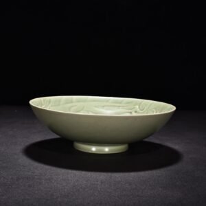 Song Dynasty Yaozhou kiln carved sea water dragon pattern bowl
