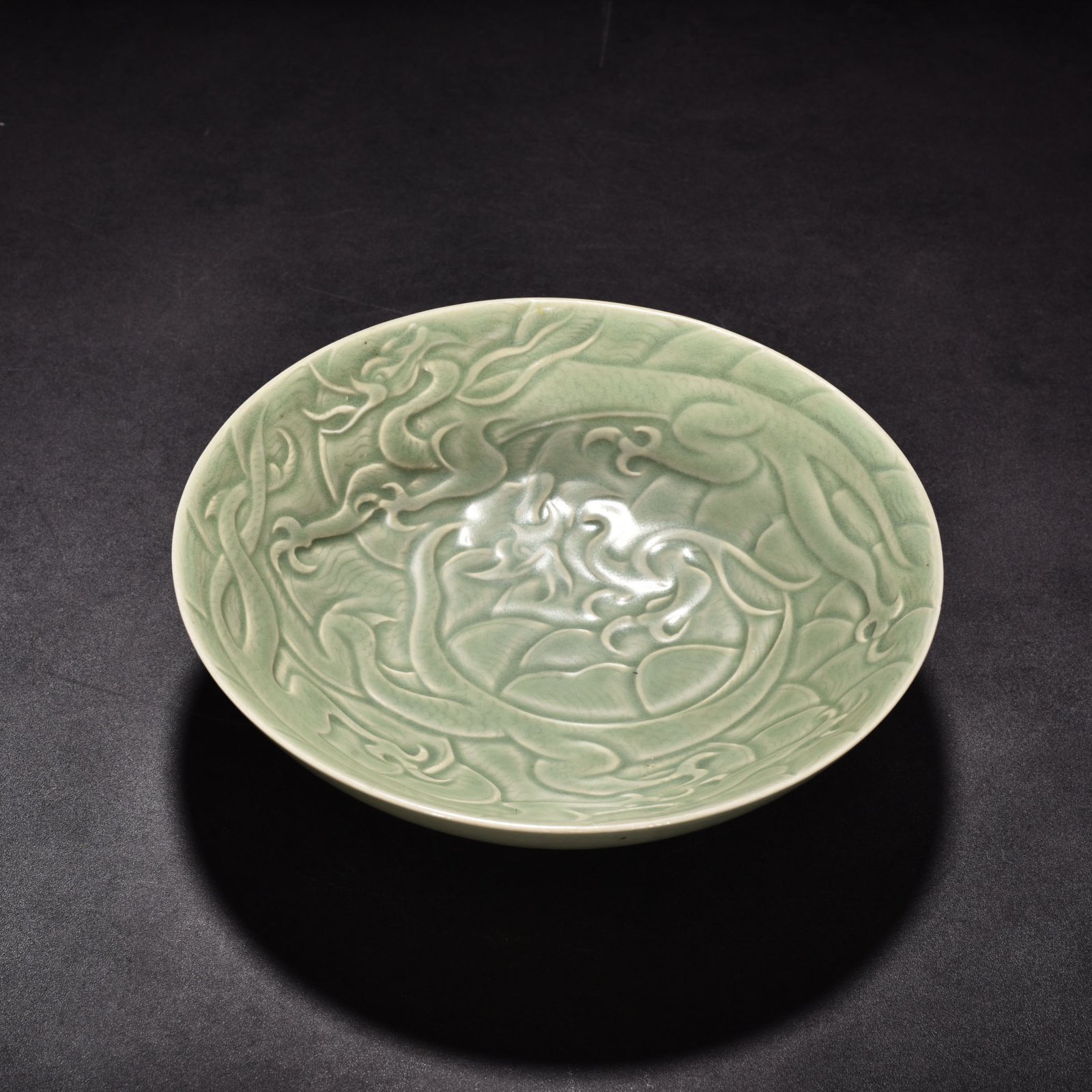 Song Dynasty Yaozhou kiln carved sea water dragon pattern bowl