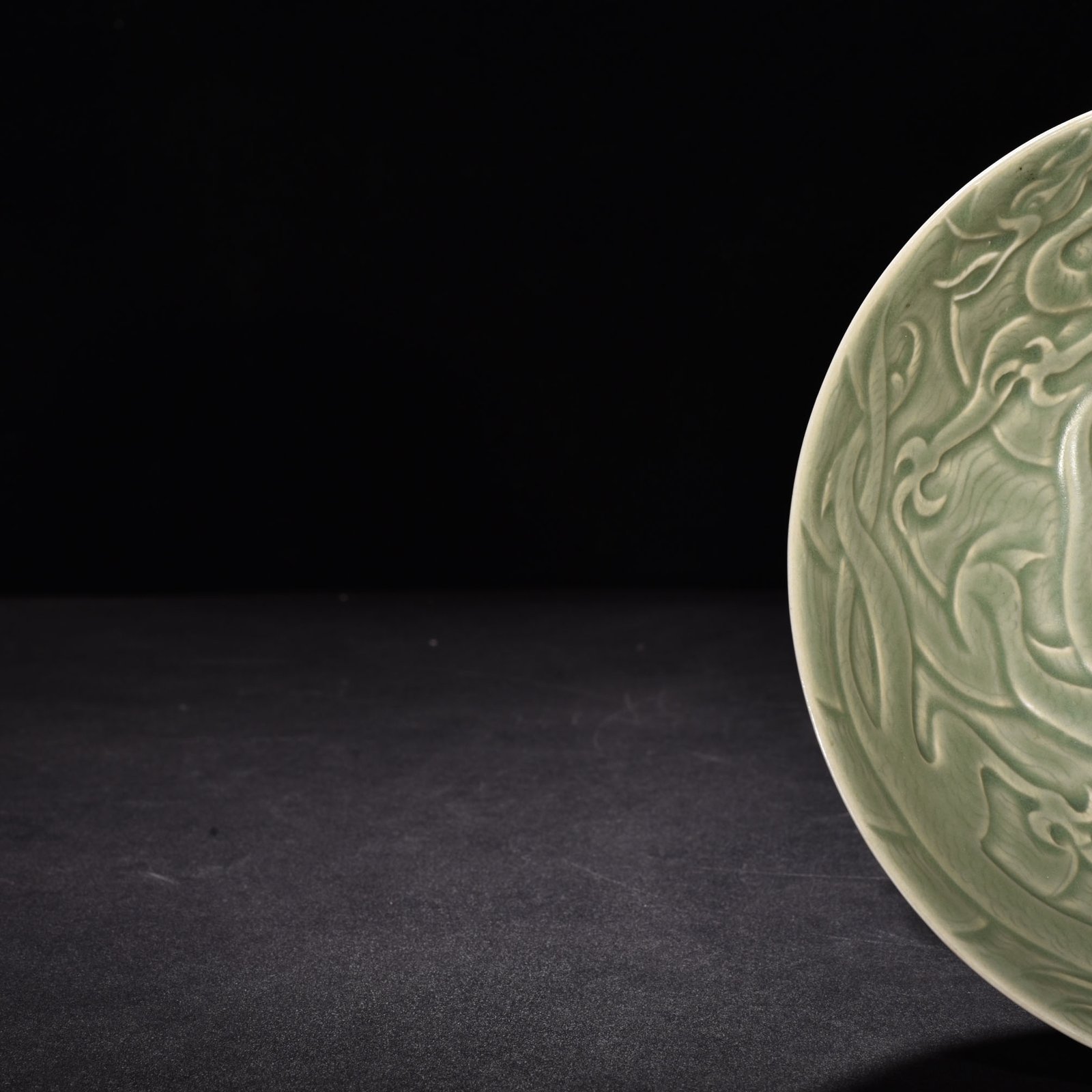 Song Dynasty Yaozhou kiln carved sea water dragon pattern bowl