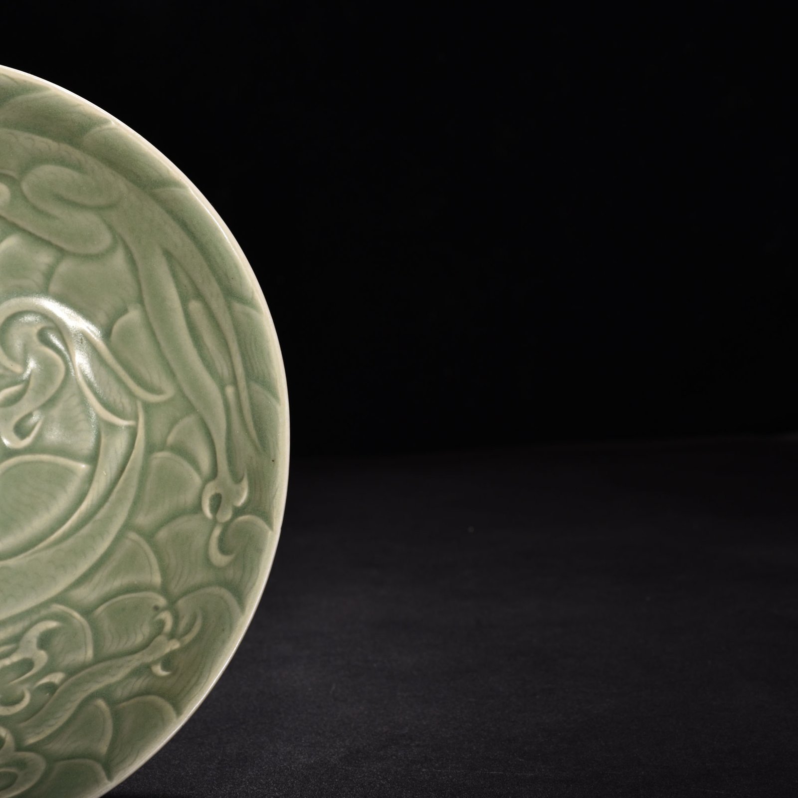 Song Dynasty Yaozhou kiln carved sea water dragon pattern bowl