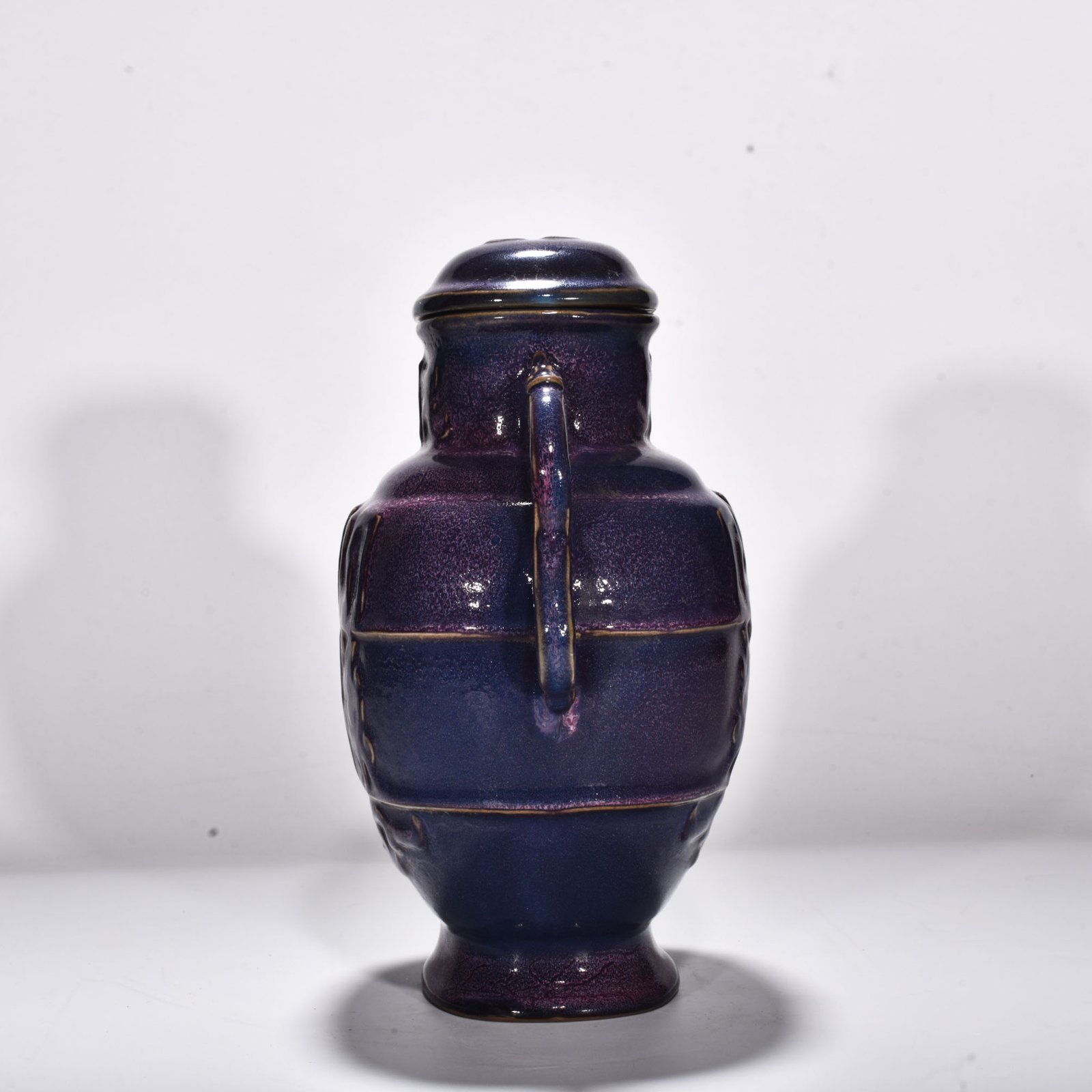 Song Dynasty Jun kiln rose purple glaze animal mask pattern double-ear lid jar