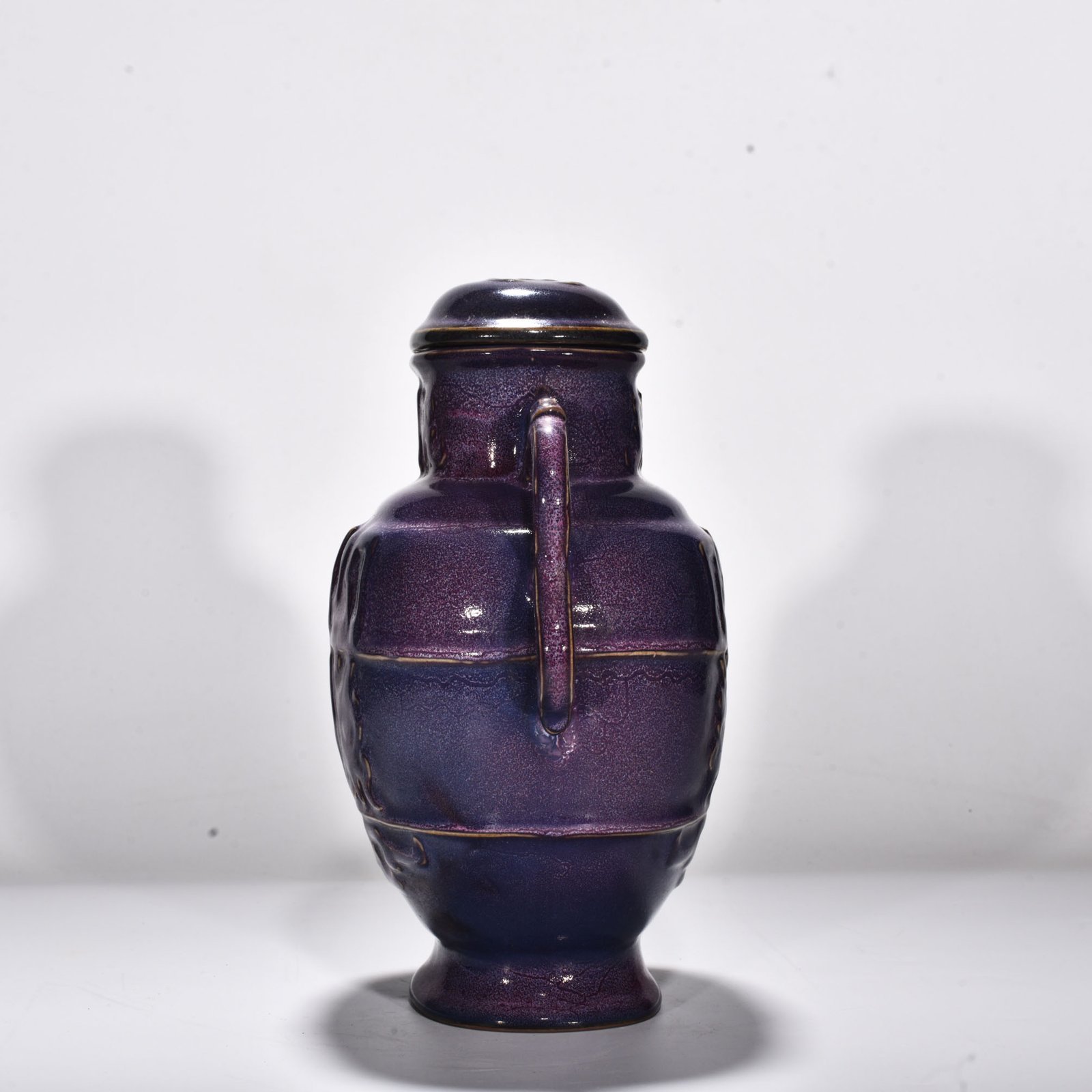 Song Dynasty Jun kiln rose purple glaze animal mask pattern double-ear lid jar