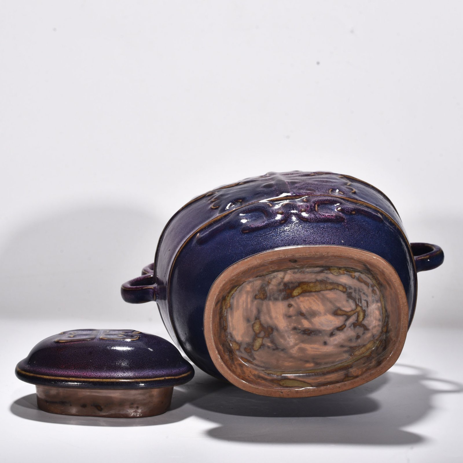 Song Dynasty Jun kiln rose purple glaze animal mask pattern double-ear lid jar