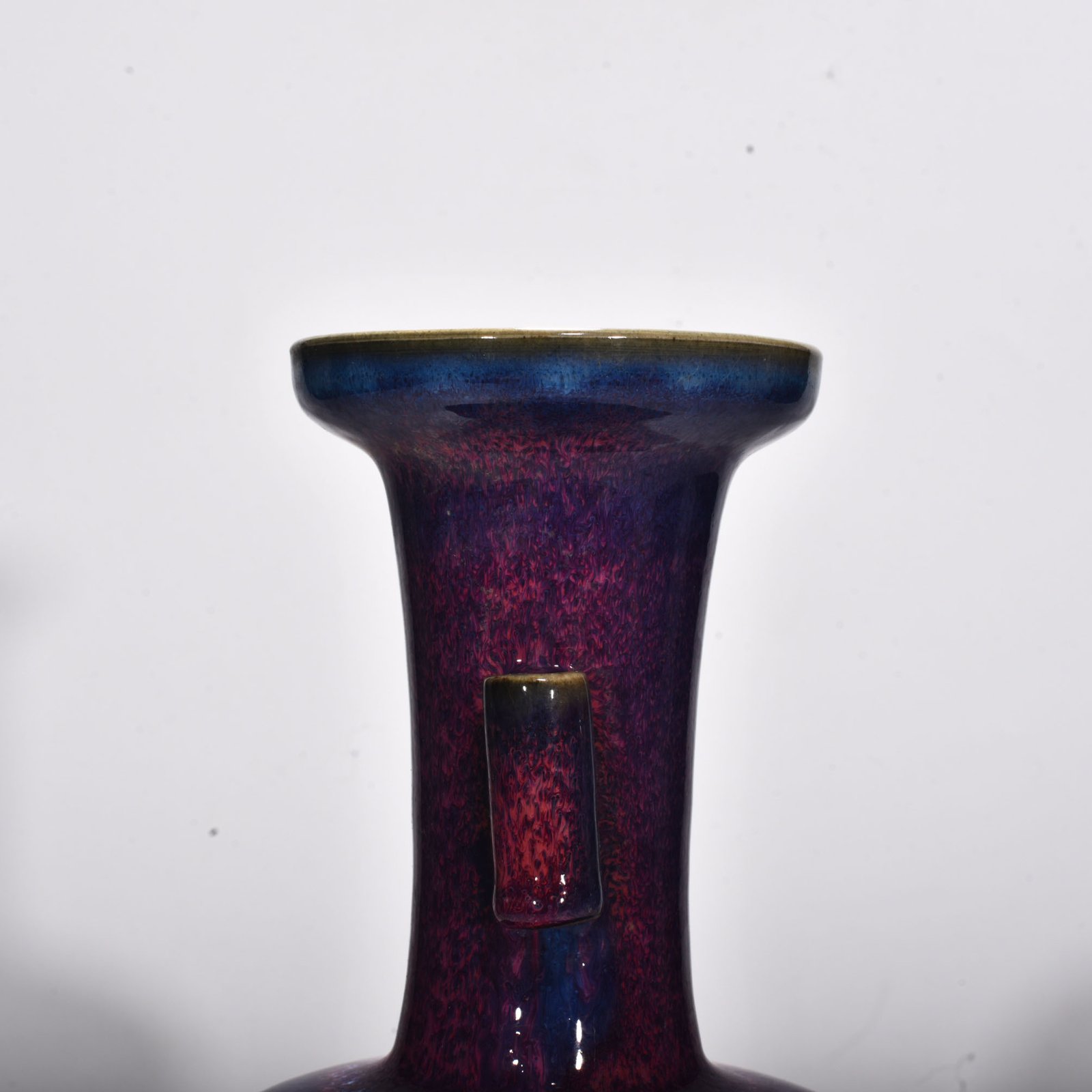 Song Dynasty Jun kiln rose purple glaze animal head pierced ear vase