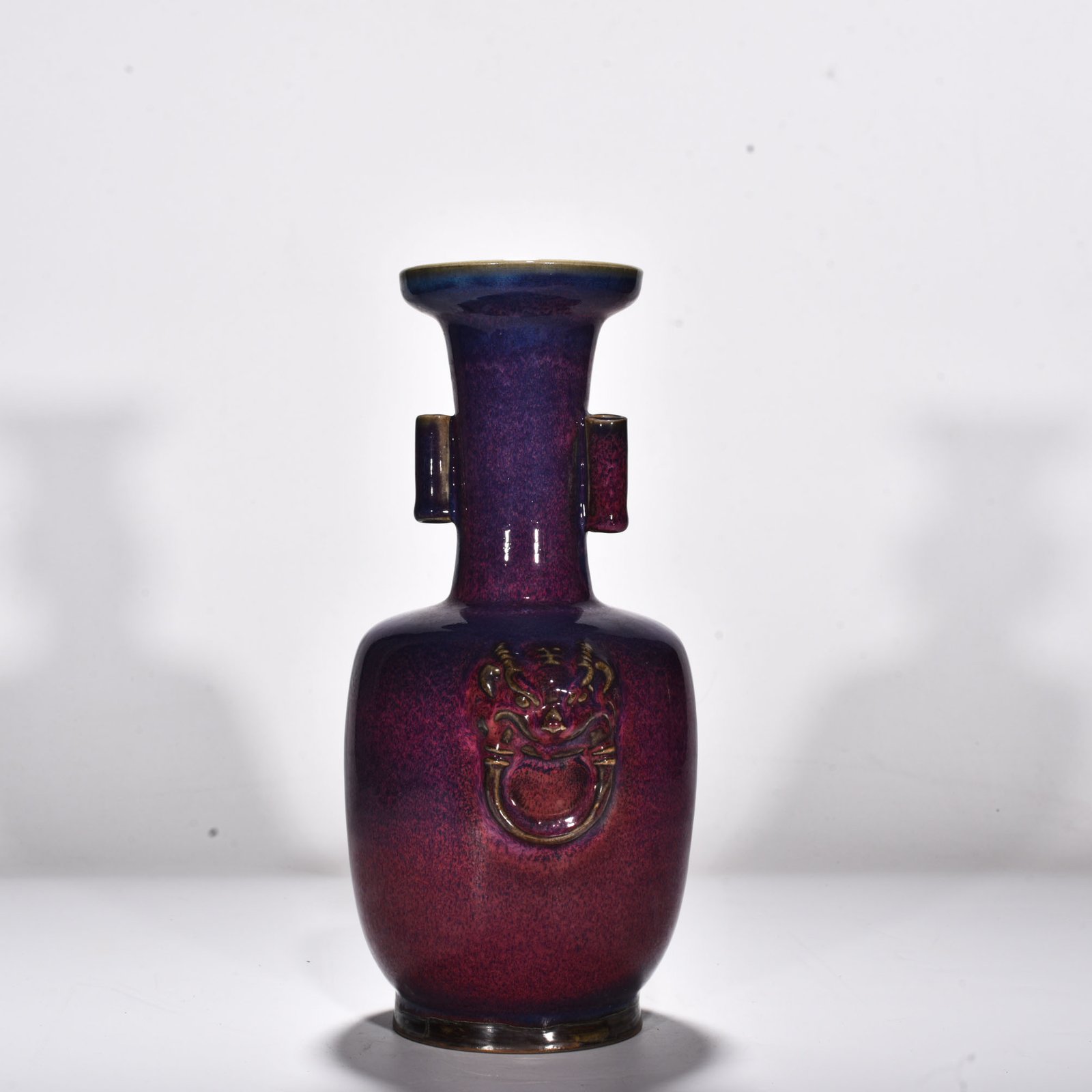 Song Dynasty Jun kiln rose purple glaze animal head pierced ear vase