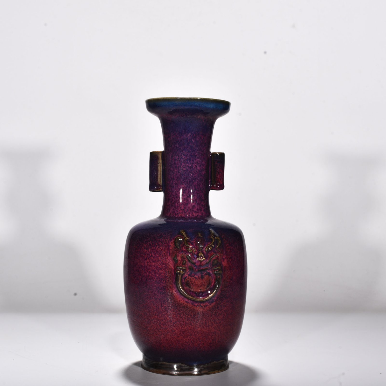 Song Dynasty Jun kiln rose purple glaze animal head pierced ear vase