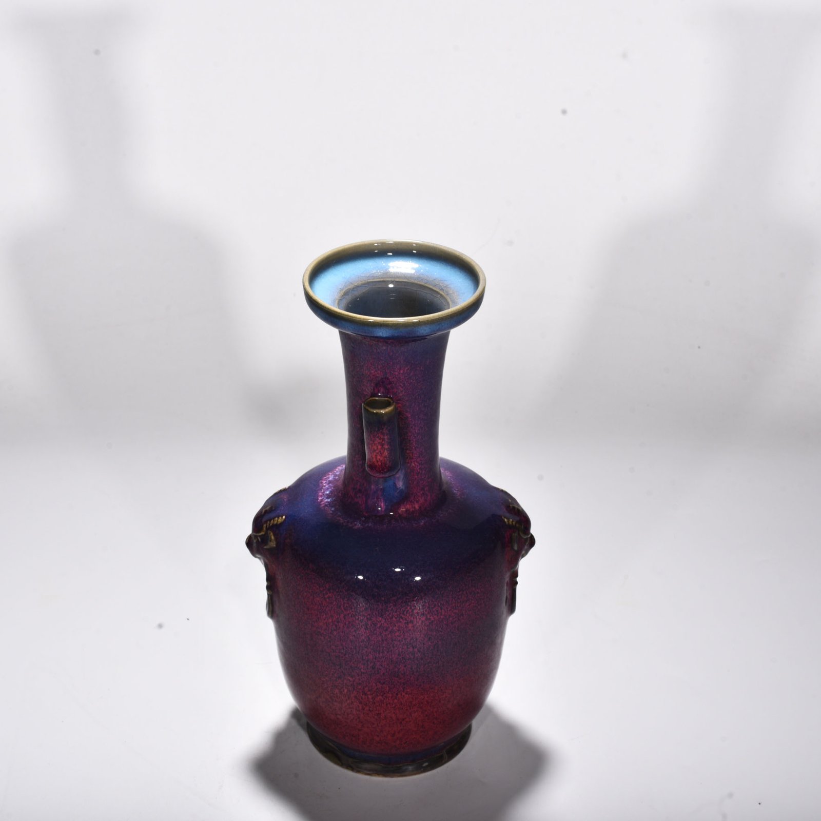 Song Dynasty Jun kiln rose purple glaze animal head pierced ear vase
