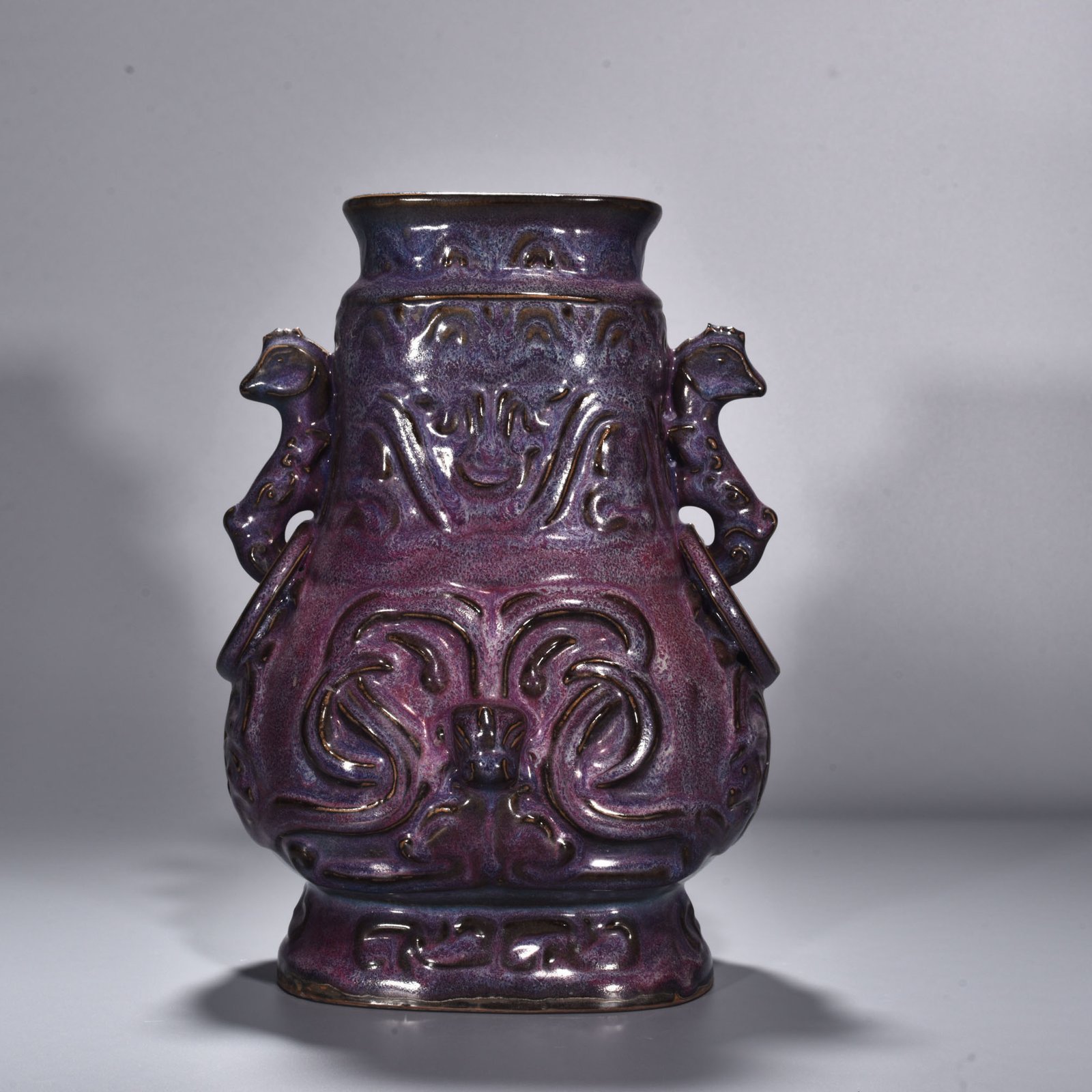 Song Dynasty Jun kiln rose purple glaze Kui dragon pattern double-eared flat kettle