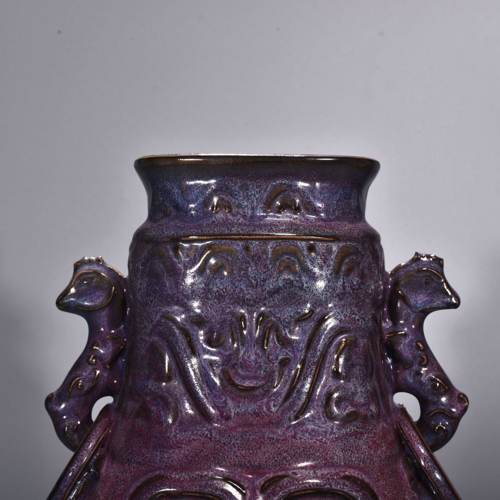 Song Dynasty Jun kiln rose purple glaze Kui dragon pattern double-eared flat kettle
