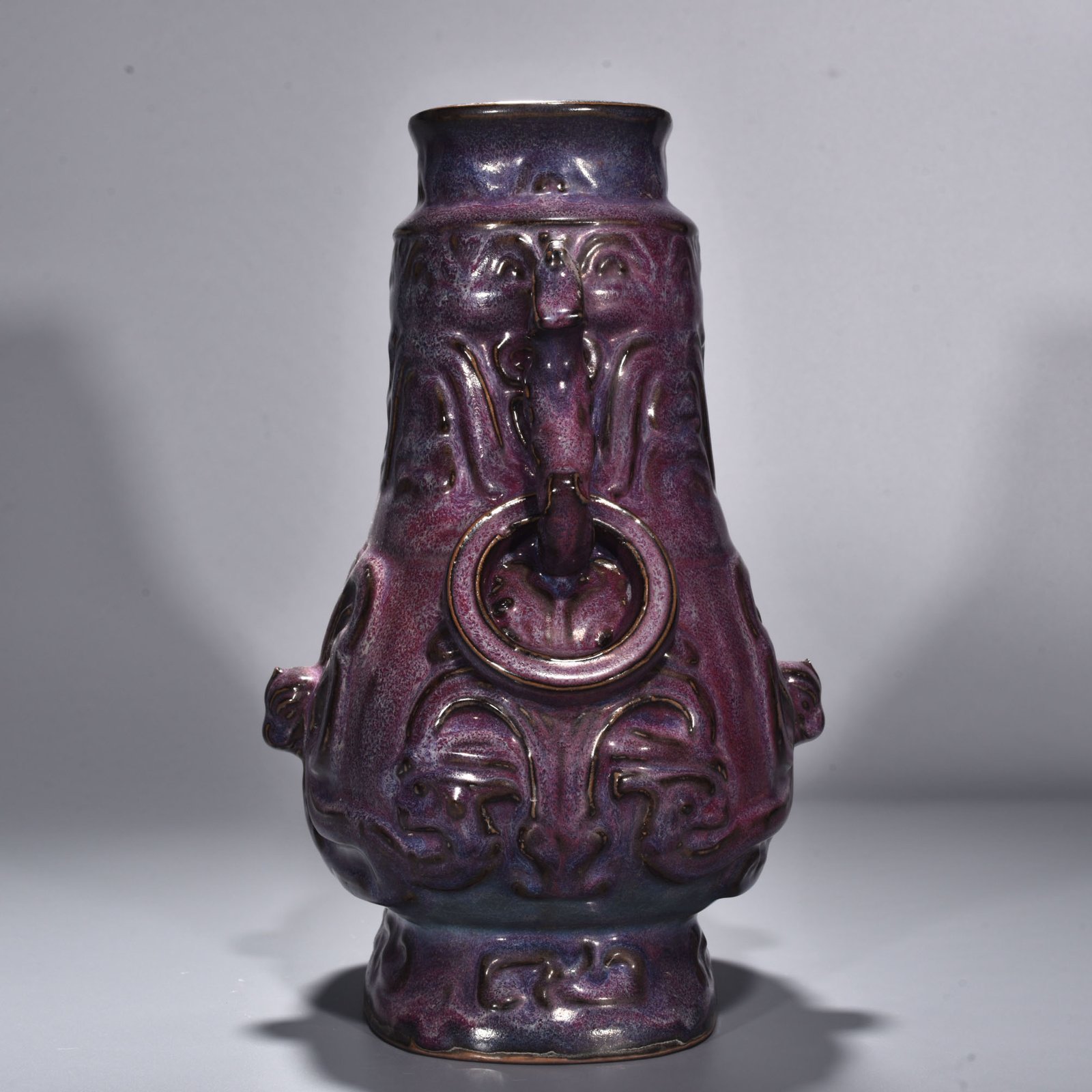 Song Dynasty Jun kiln rose purple glaze Kui dragon pattern double-eared flat kettle