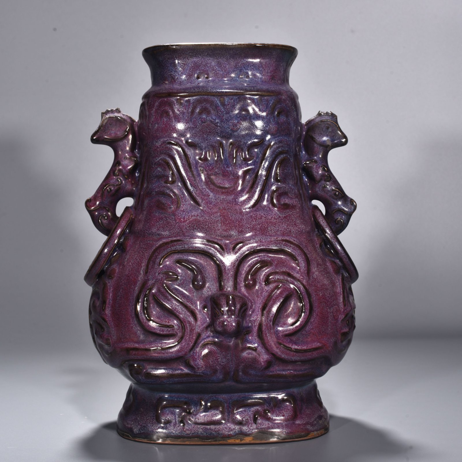 Song Dynasty Jun kiln rose purple glaze Kui dragon pattern double-eared flat kettle