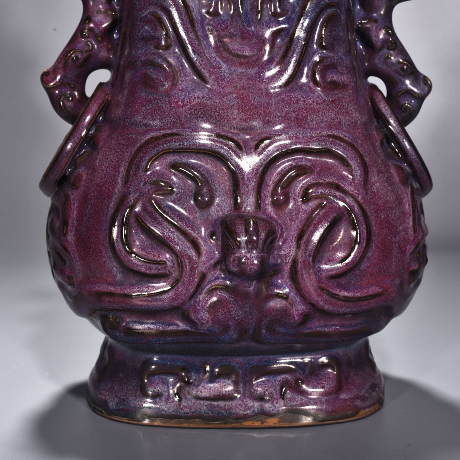 Song Dynasty Jun kiln rose purple glaze Kui dragon pattern double-eared flat kettle
