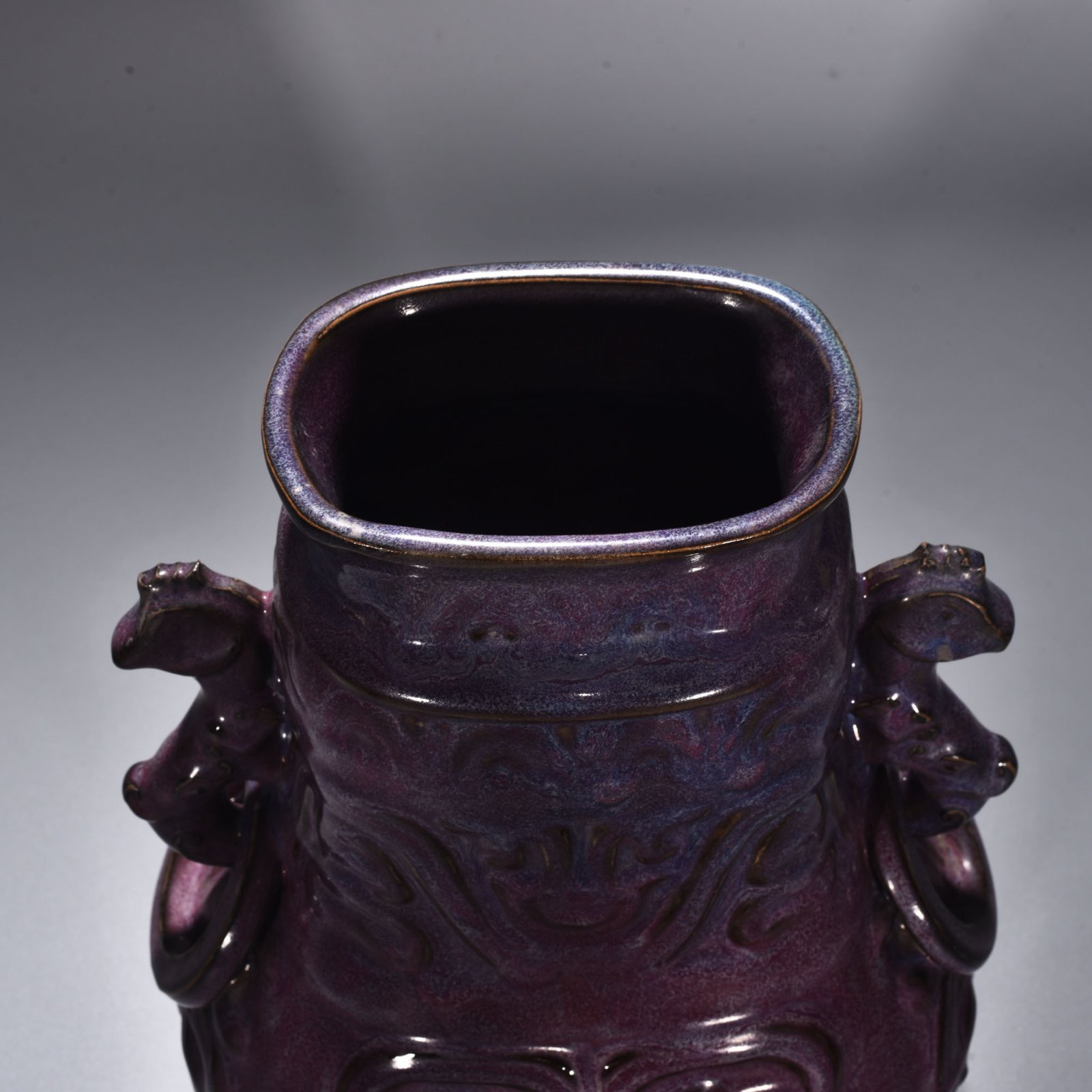 Song Dynasty Jun kiln rose purple glaze Kui dragon pattern double-eared flat kettle
