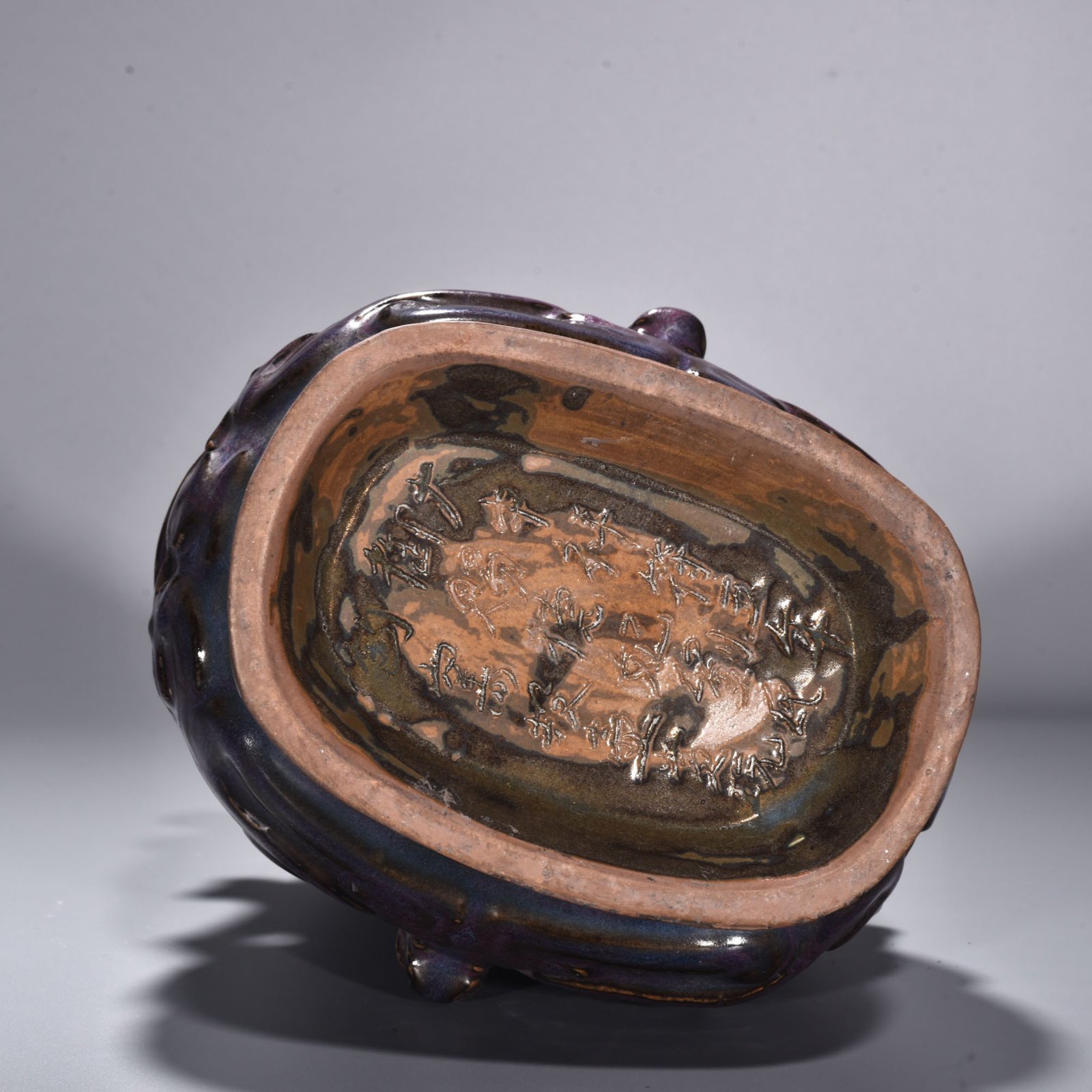 Song Dynasty Jun kiln rose purple glaze Kui dragon pattern double-eared flat kettle