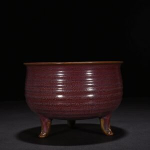 Song Dynasty Jun kiln rose purple glaze three-legged furnace