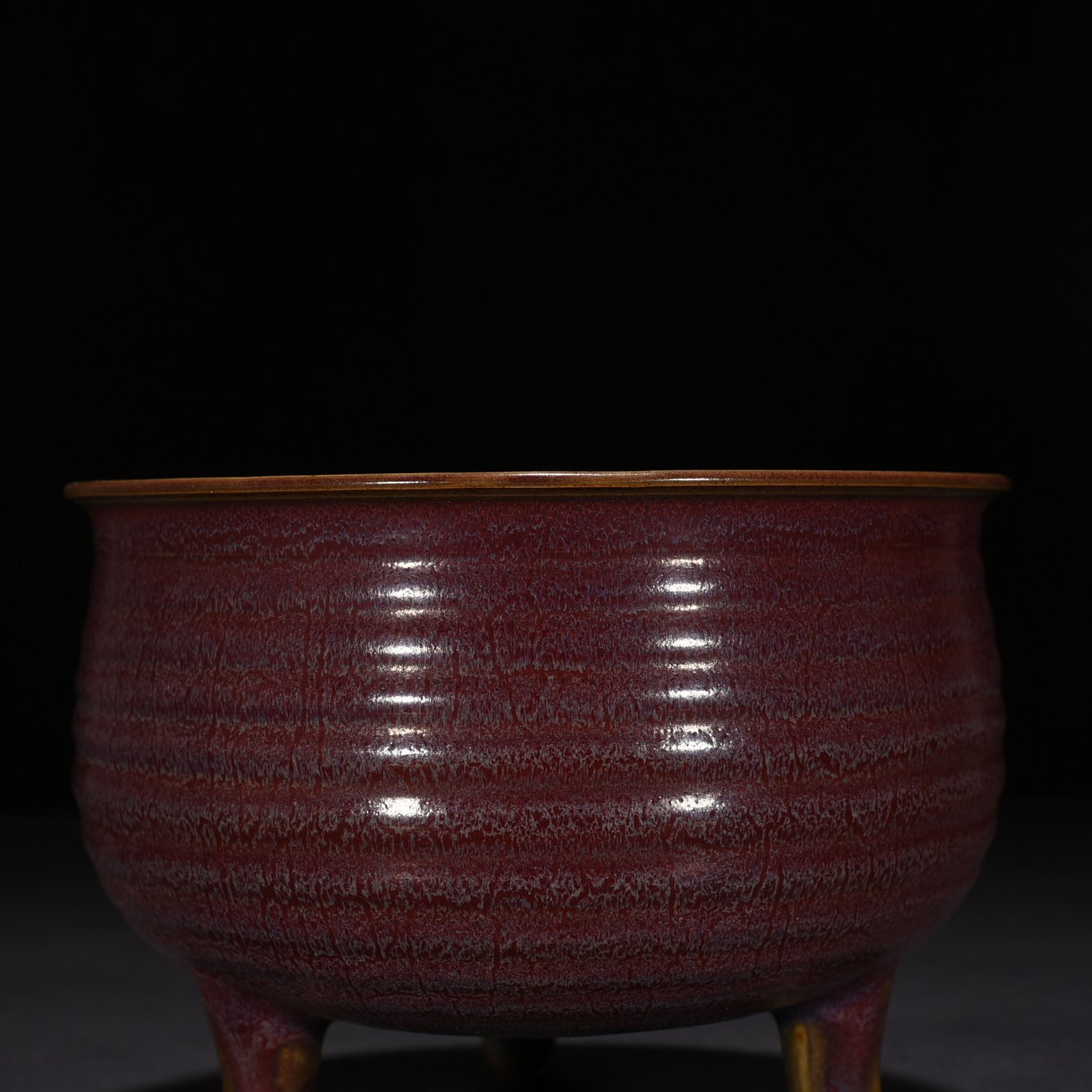 Song Dynasty Jun kiln rose purple glaze three-legged furnace