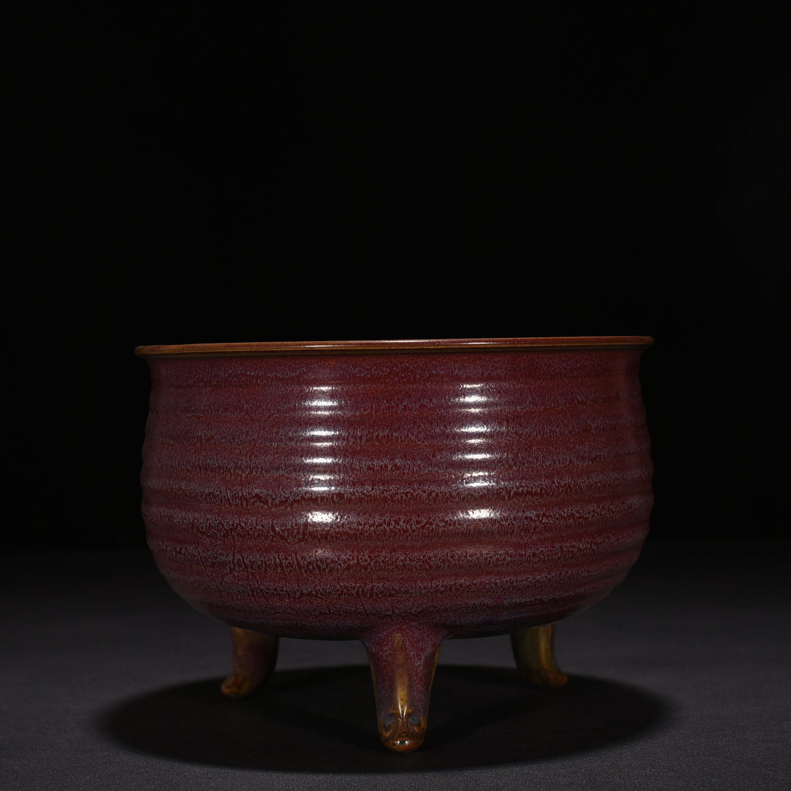 Song Dynasty Jun kiln rose purple glaze three-legged furnace