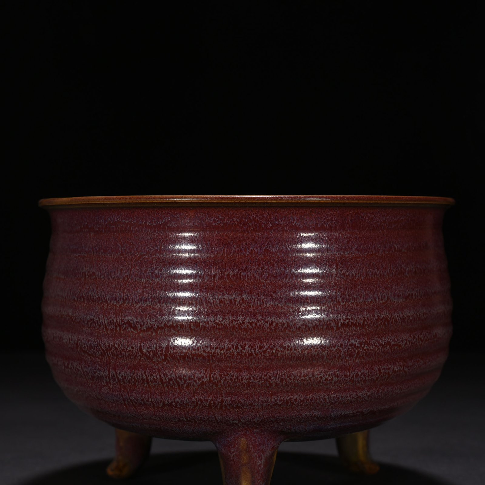 Song Dynasty Jun kiln rose purple glaze three-legged furnace