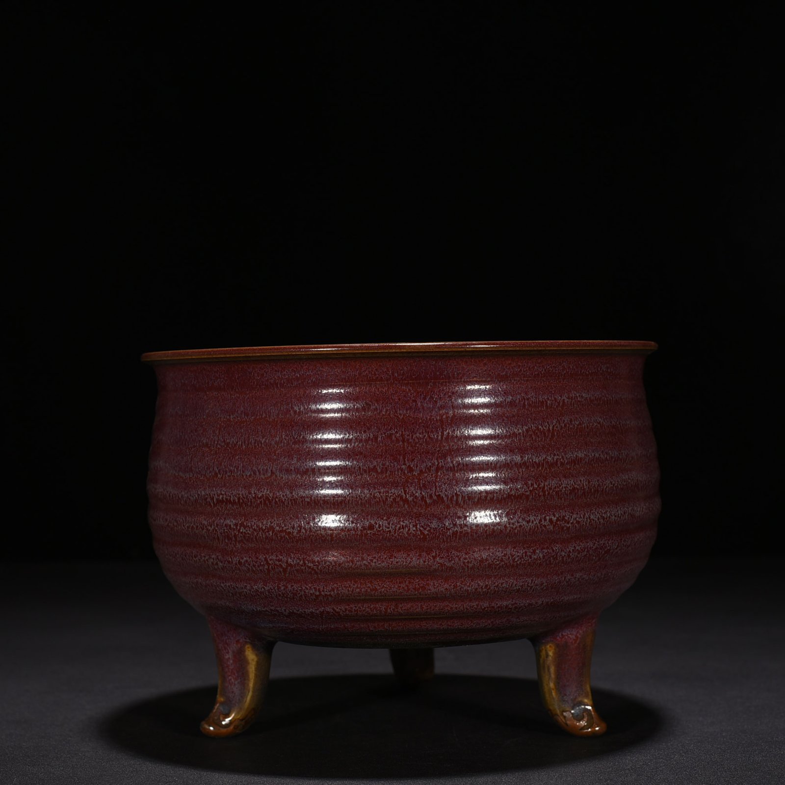 Song Dynasty Jun kiln rose purple glaze three-legged furnace