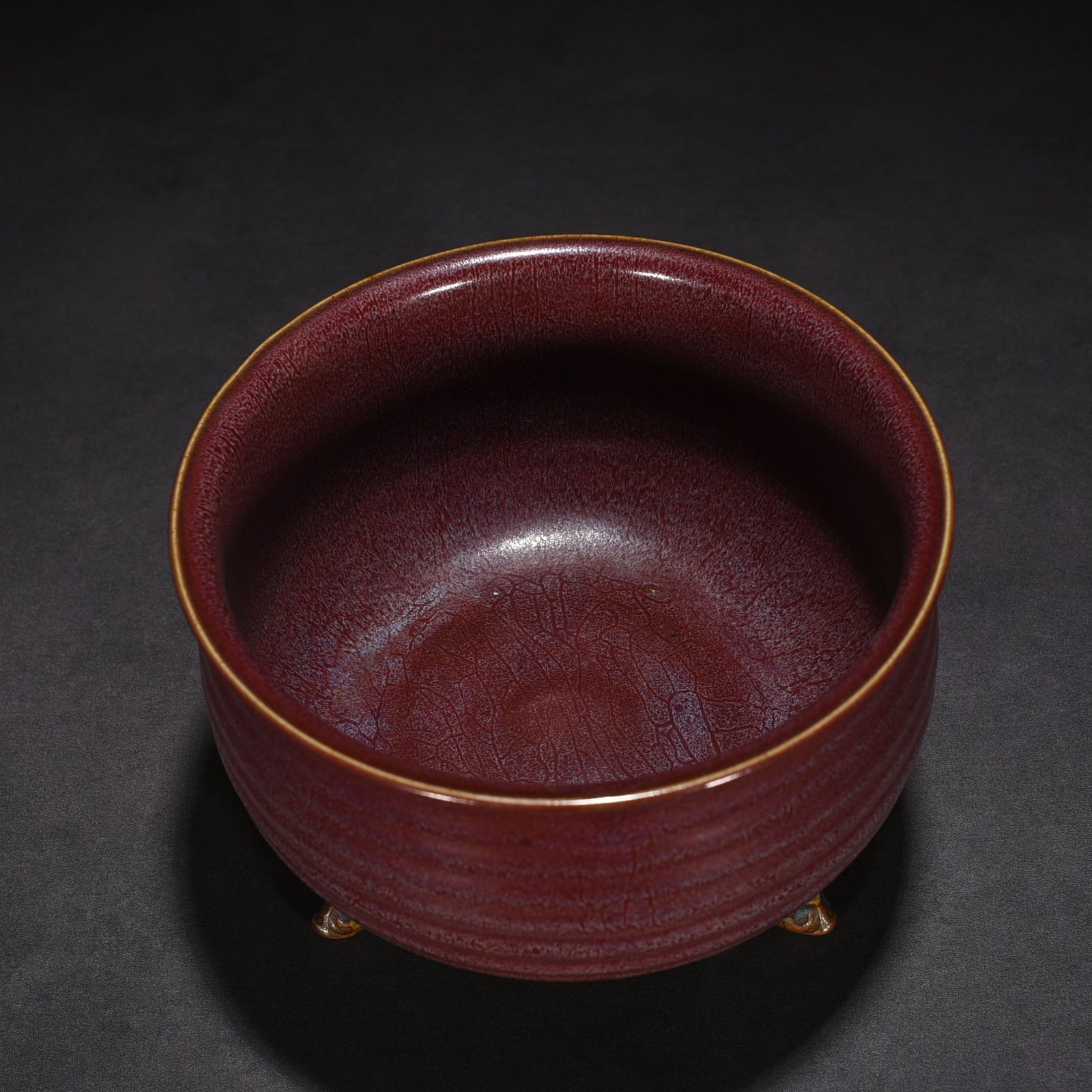 Song Dynasty Jun kiln rose purple glaze three-legged furnace