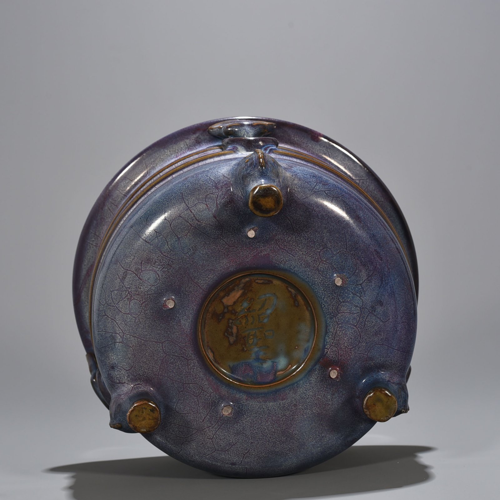Song Dynasty Jun kiln rose purple glaze dazzling pattern three-legged furnace