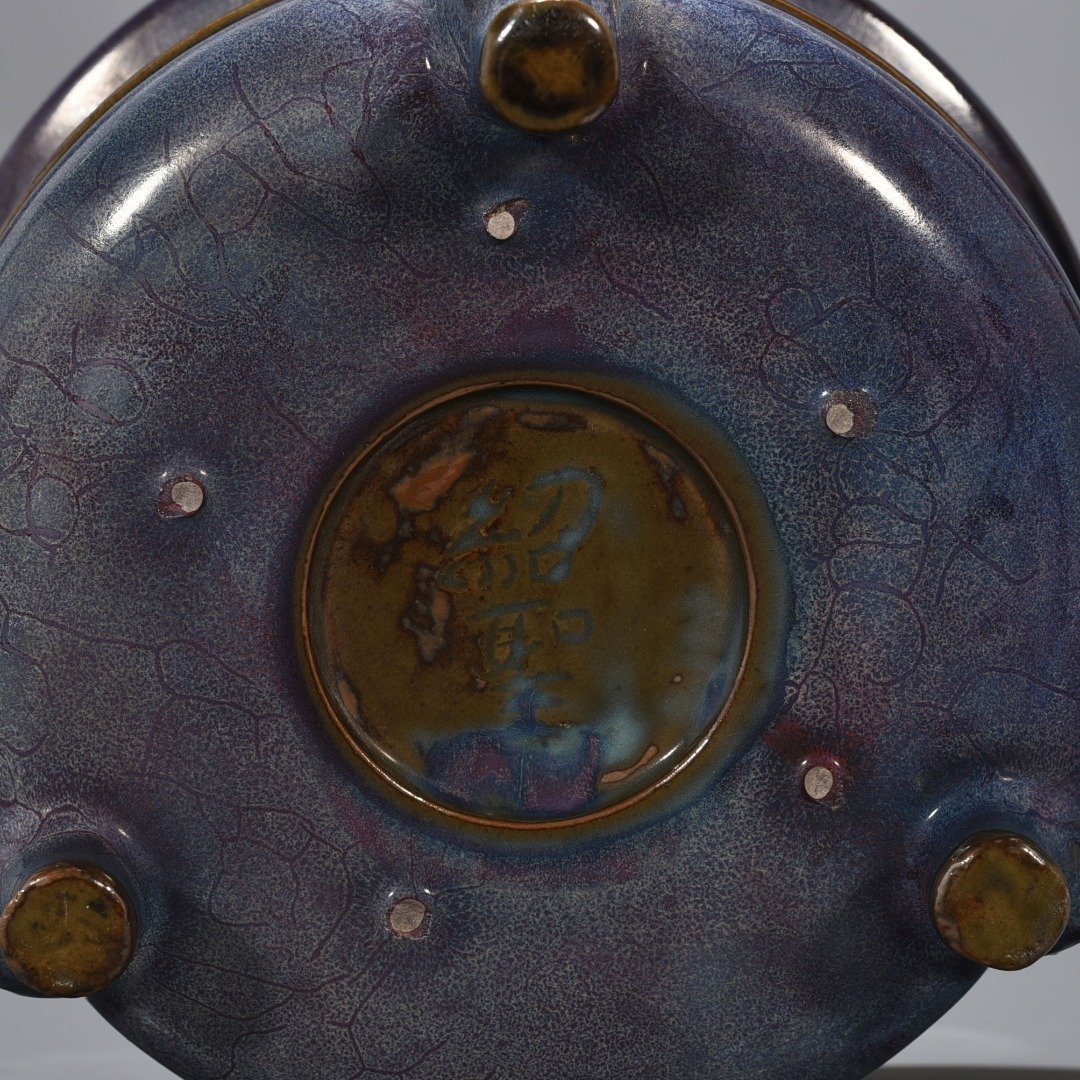Song Dynasty Jun kiln rose purple glaze dazzling pattern three-legged furnace