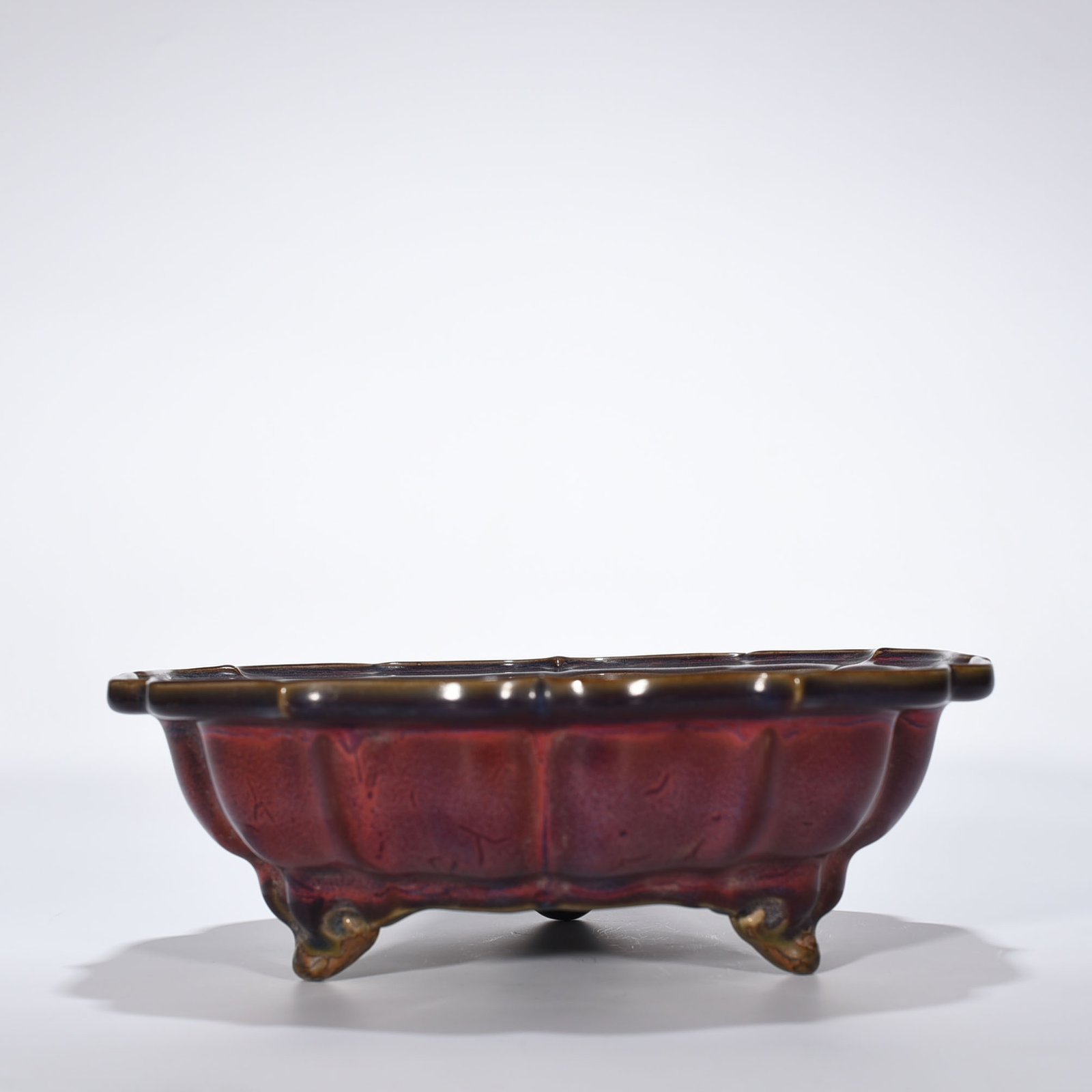 Song Dynasty Jun kiln rose purple glaze sunflower mouth three-legged wash