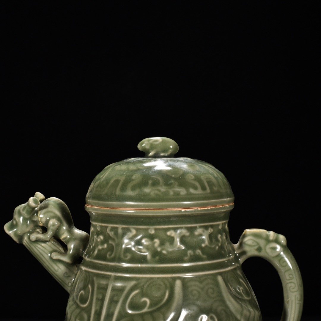 Song Dynasty Longquan kiln plum celadon-glazed ewer with animal face