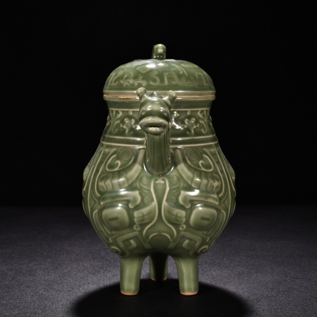 Song Dynasty Longquan kiln plum celadon-glazed ewer with animal face