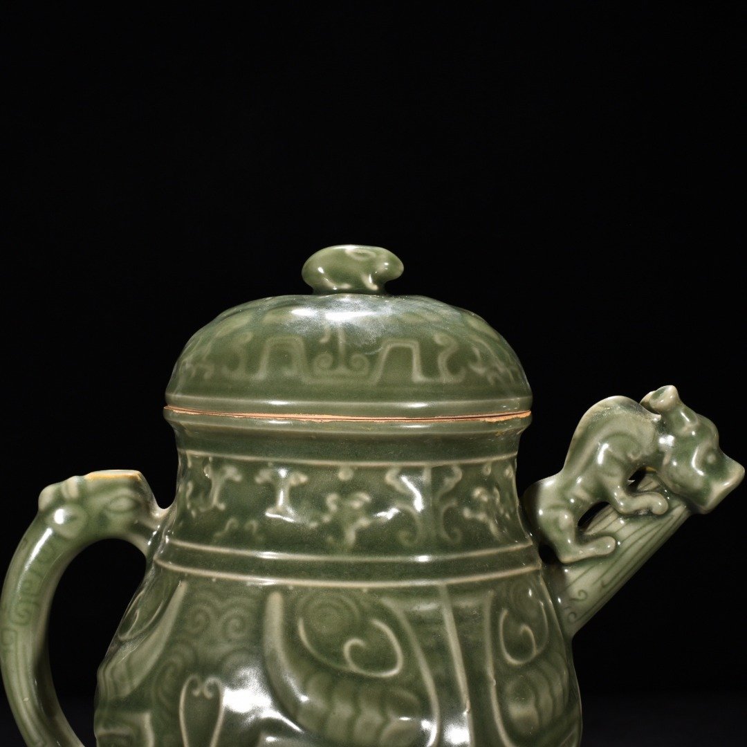 Song Dynasty Longquan kiln plum celadon-glazed ewer with animal face