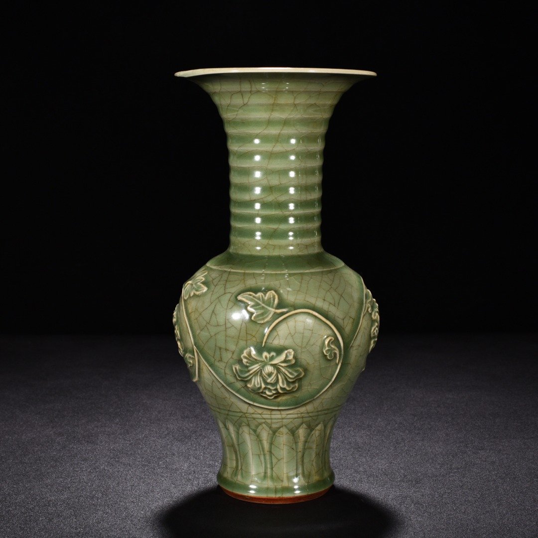 Song Dynasty Longquan kiln plum celadon glaze engraved flower vase