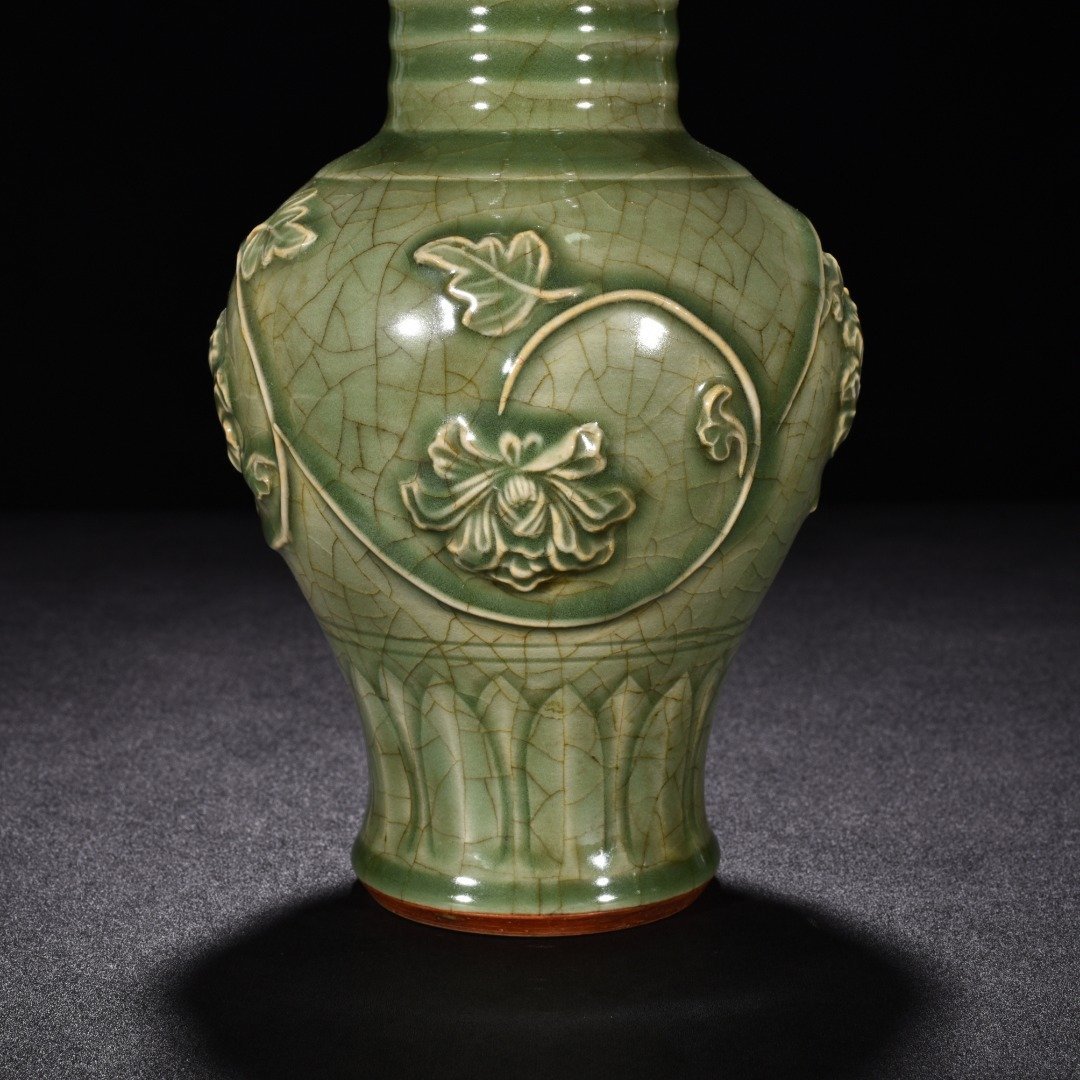 Song Dynasty Longquan kiln plum celadon glaze engraved flower vase