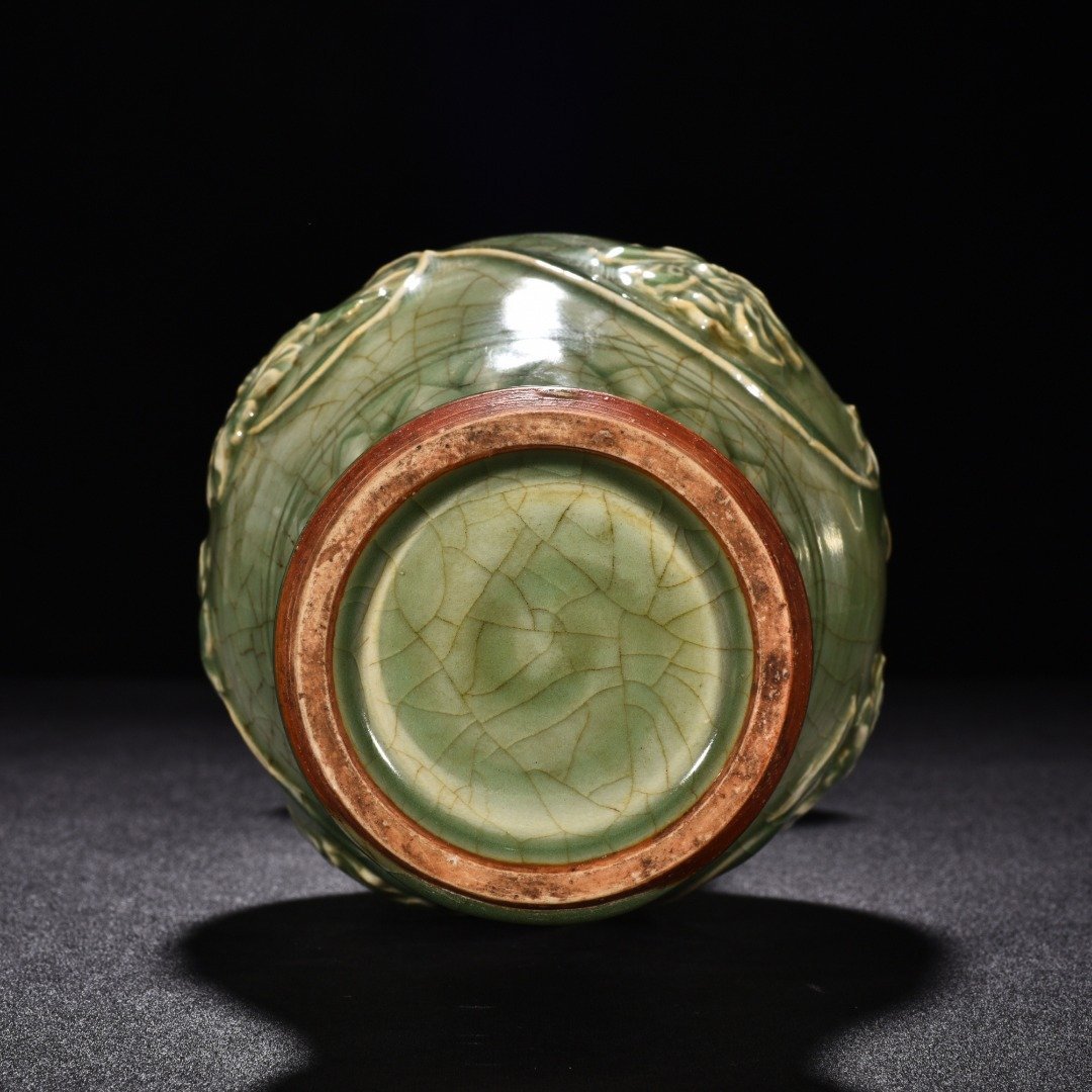 Song Dynasty Longquan kiln plum celadon glaze engraved flower vase