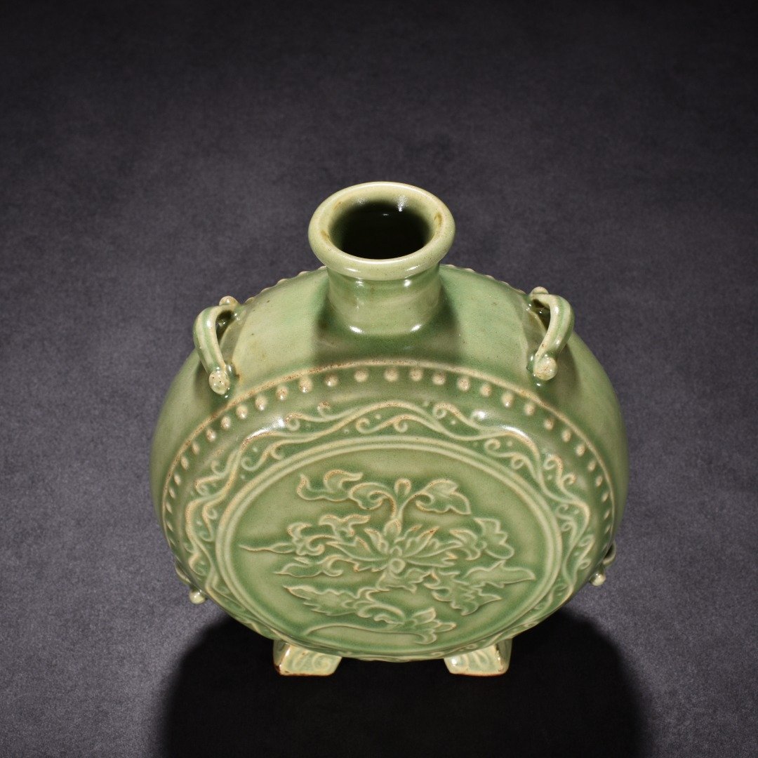 Song Dynasty Longquan kiln plum celadon glaze engraved flower pattern flat vase