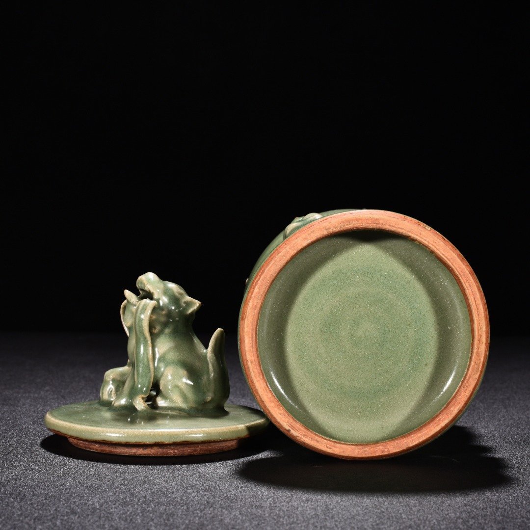 Song Dynasty Longquan kiln plum green glaze hollow lion smoker