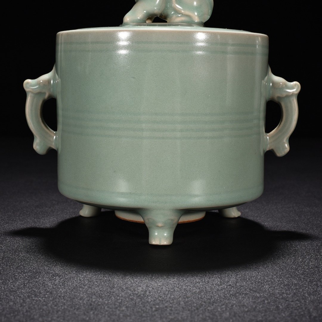 Song Dynasty Longquan kiln pink celadon glaze three-legged and double-eared smoker